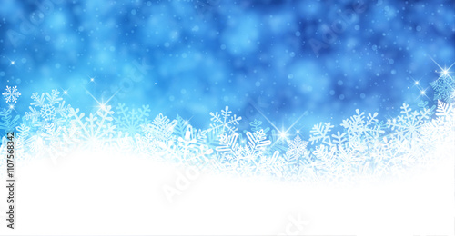 A beautiful frosty snowflake border on a gradient blue background with sparkling stars. Perfect for winter, holiday, and festive themes.