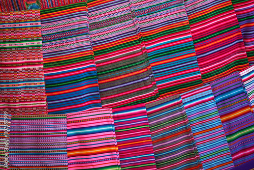 Vibrant threads of tradition.This stunning handmade textile from Carhuaz-Ancash brings the rich colors and culture of the Andes to life. Every stitch tells a story, weaving together history and art. photo