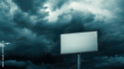 Blank Traffic Sign Against Dark Stormy Sky with Ominous Clouds photo