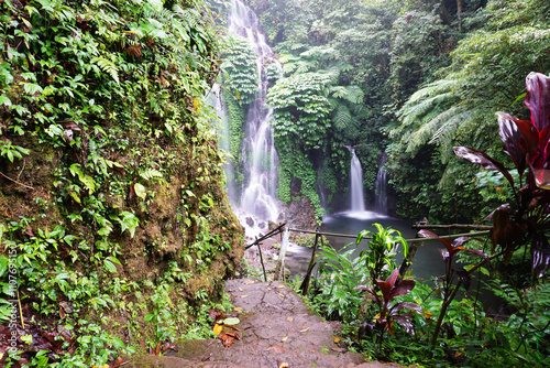 Banyu Wana Amertha Waterfall view. Natural waterfall backgrounds. Beautiful nature landscape of waterfall with smooth water flow in Wanogiri, Buleleng - Singaraja, Bali - Indonesia. photo