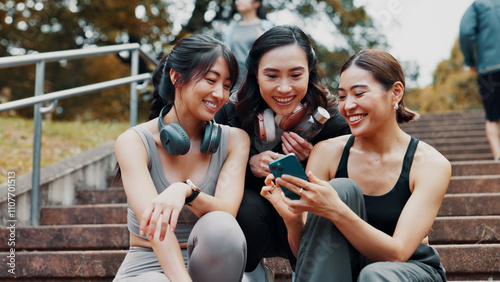 фотографія Fitness, phone and group of women on stairs together with smile, relax and search on social media