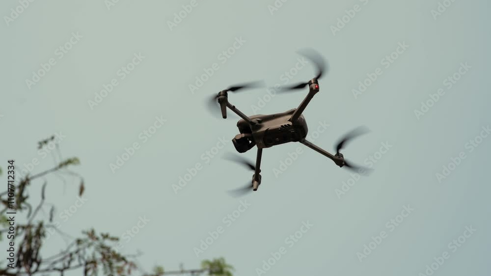 Drone fly  from sky in forest in military operation