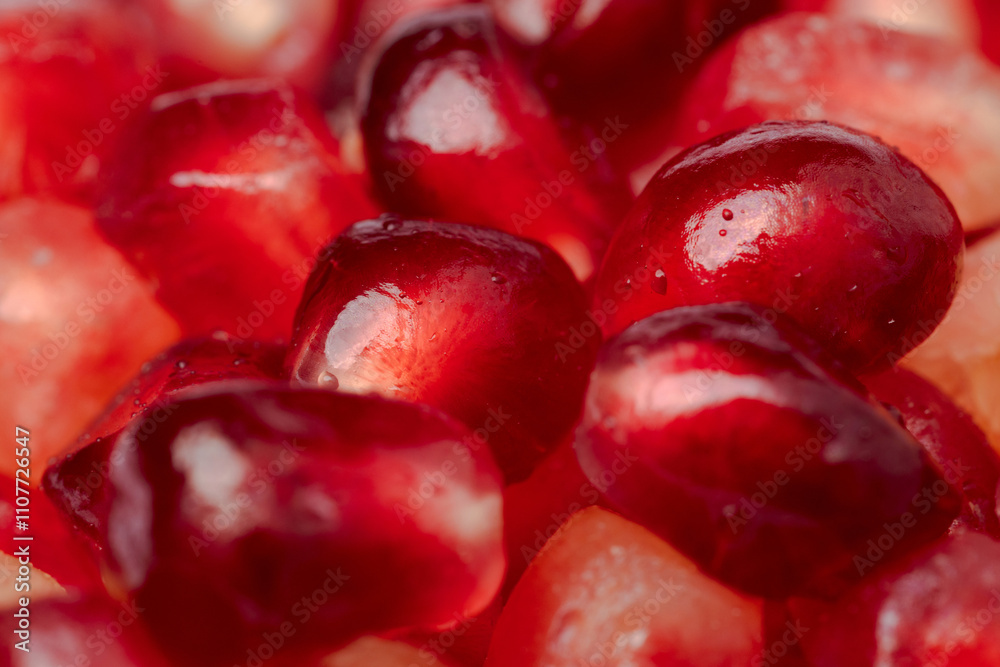 Delicious red ripe juicy pomegranate seed background Delicious red ripe juicy pomegranate seed background