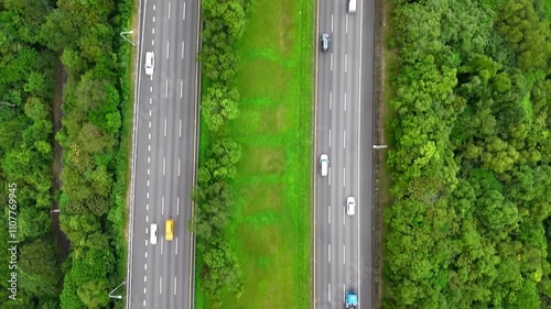 Top-Down View of Divided Highway and Lush Green Median