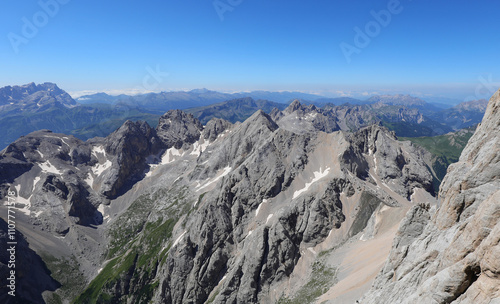 Breathtaking view with the mountain peaks in the European Alps in summer from over 3000 meters altitude photo