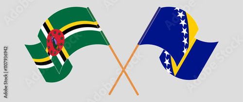 Crossed and waving flags of Dominica and Bosnia and Herzegovina. Vector illustration