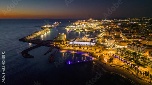 Vászonkép Small Italian town seen from above, sea and cars. Civitavecchia