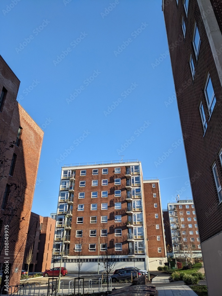 Fototapeta premium Top Floors of a Highrise Council Block of Flats with Blue Sky