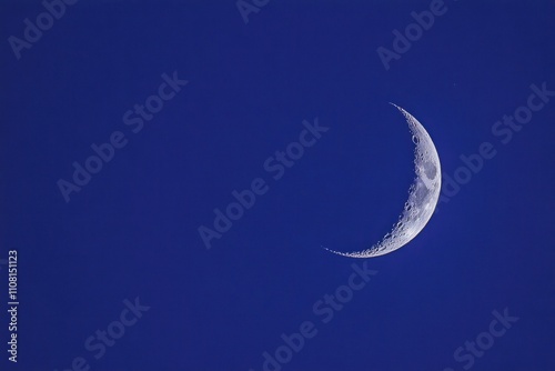 Crescent Moon in a Deep Blue Sky