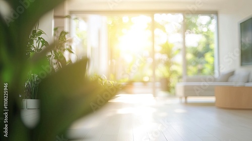 Blur living room at home with morning sunlight at big window for background usage. blur interior background concept. white, britht tone. photo