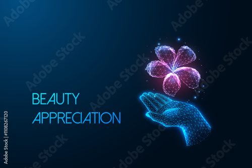 Beauty appreciation concept with glowing digital flower floating above hand on dark blue background.
