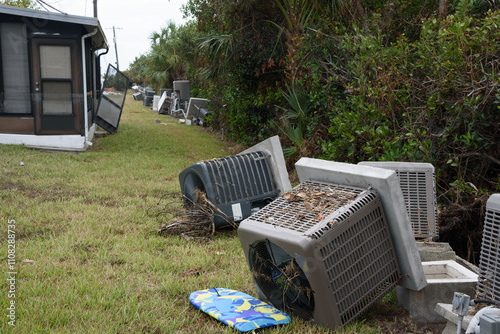 Toppled AC's following flooding due to Hurricane Milton and Helene in Florida photo