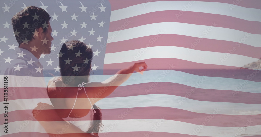 Naklejka premium American flag image over couple embracing and looking at ocean