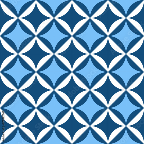 A geometric pattern featuring alternating dark blue and white shapes on a light blue background, creating a visually engaging design.