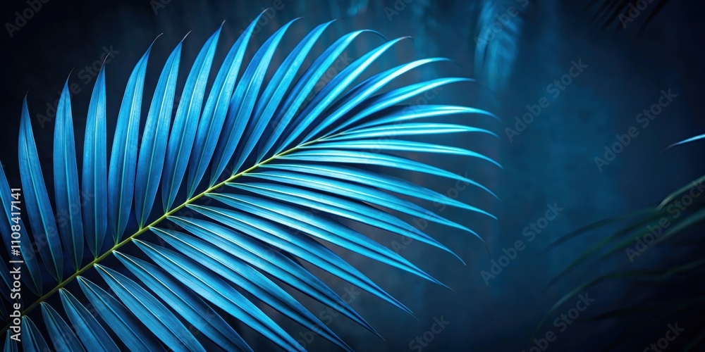 Obraz premium Blue palm leaf against a dark nature background , tropical, exotic, vibrant, botanical, foliage, lush, vibrant, colorful