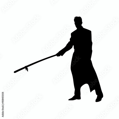 Silhouette of a person in a long coat wielding a staff in a dramatic pose