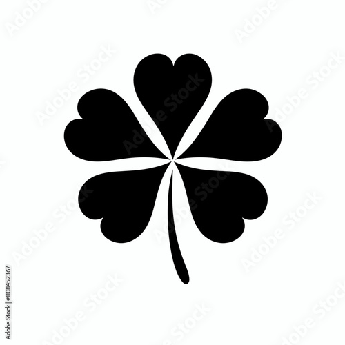 Black silhouette of a four-leaf clover on a light background symbolizing luck and prosperity