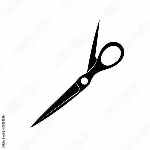 Scissors lying on a flat surface with a sleek design and sharp blades