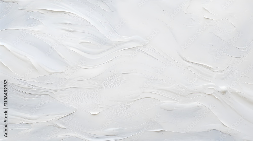 Obraz premium A smooth, white textured surface resembling paint or plaster.