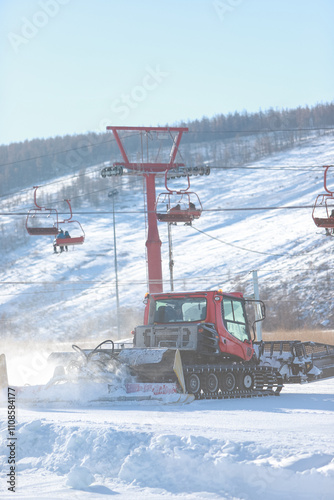 Mongolian snow skiing Resort in Ulaanbaatar. Young boys skating on hoverboard.