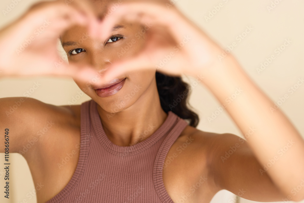 Eye Care Love: A Woman Smiling Joyfully Through Heart-Shaped Hands. Represents Connection, Affection, and Self-Love. Warm Tones Create a Sense of Happiness and Serenity. Eye Care Love: A Woman Smiling Joyfully Through Heart-Shaped Hands. Represents Connection, Affection, and Self-Love. Warm Tones Create a Sense of Happiness and Serenity.