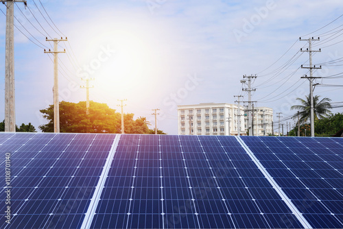 Renewable energy, solar cell panels with electricity towers and evening sunsets