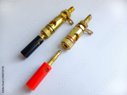 Adapter wire cable electronics audio speaker male banana plug connector isolated on white background.