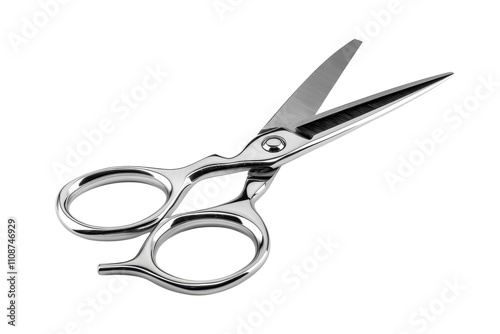 Sharp stainless steel scissors resting on a clean surface ideal for cutting various materials and crafts photo