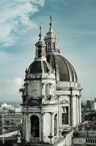 Dome and clock tower of the Cathedral of Saint Agatha in Catania photo