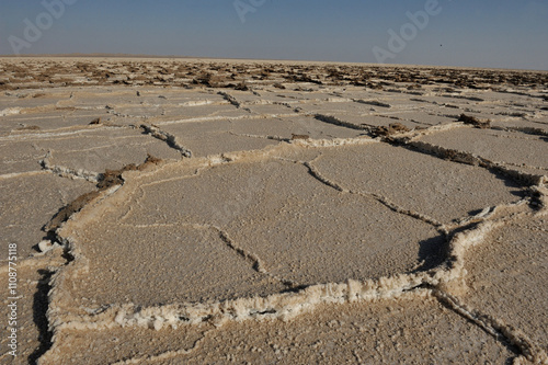 View of spectacular geometric patterns in salt flats in Iran. photo