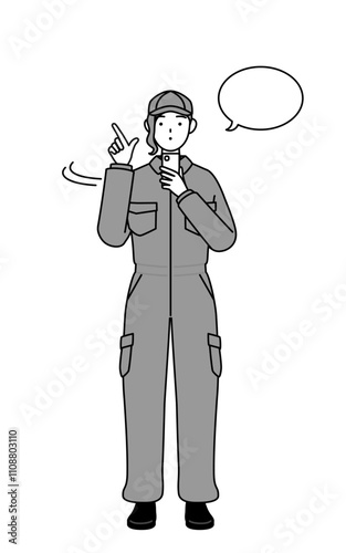 A mechanic woman in coveralls operating a smartphone.