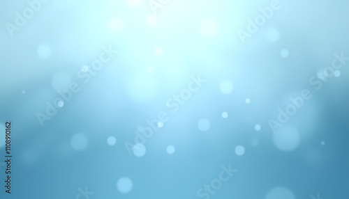 Soft blue bokeh background with shimmering lights
