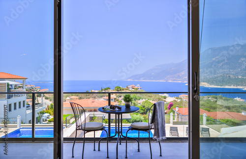 Private balcony with infinity pool and breathtaking ocean vistas