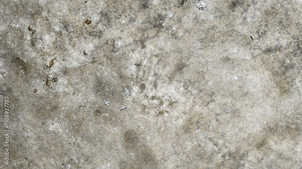 A close-up of a textured concrete surface, resembling a lunar landscape, ideal for concepts of urban decay or construction challenges A close-up of a textured concrete surface, resembling a lunar landscape, ideal for concepts of urban decay or construction challenges