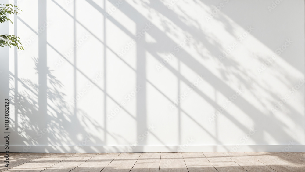 Minimalistic light background with blurred foliage shadow on white wall
