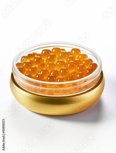 One single golden trout roe caviar pearl, perfectly round, smooth, glossy, translucent, isolated on a pure white background. The pearl appear luxurious, fresh