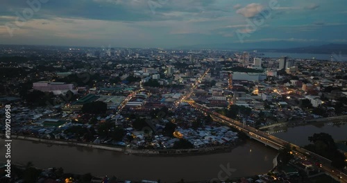 Davao City with river and residential buildings. Mindanao, Philippines. Cityscape. photo