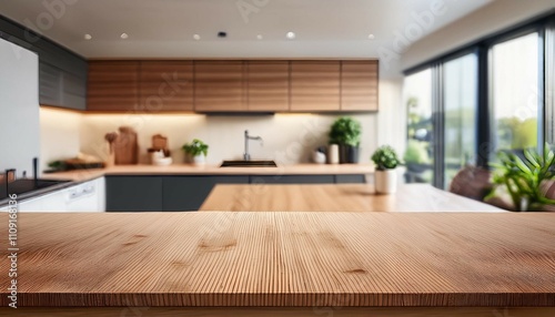 empty wooden table top counter and blur modern kitchen interior background