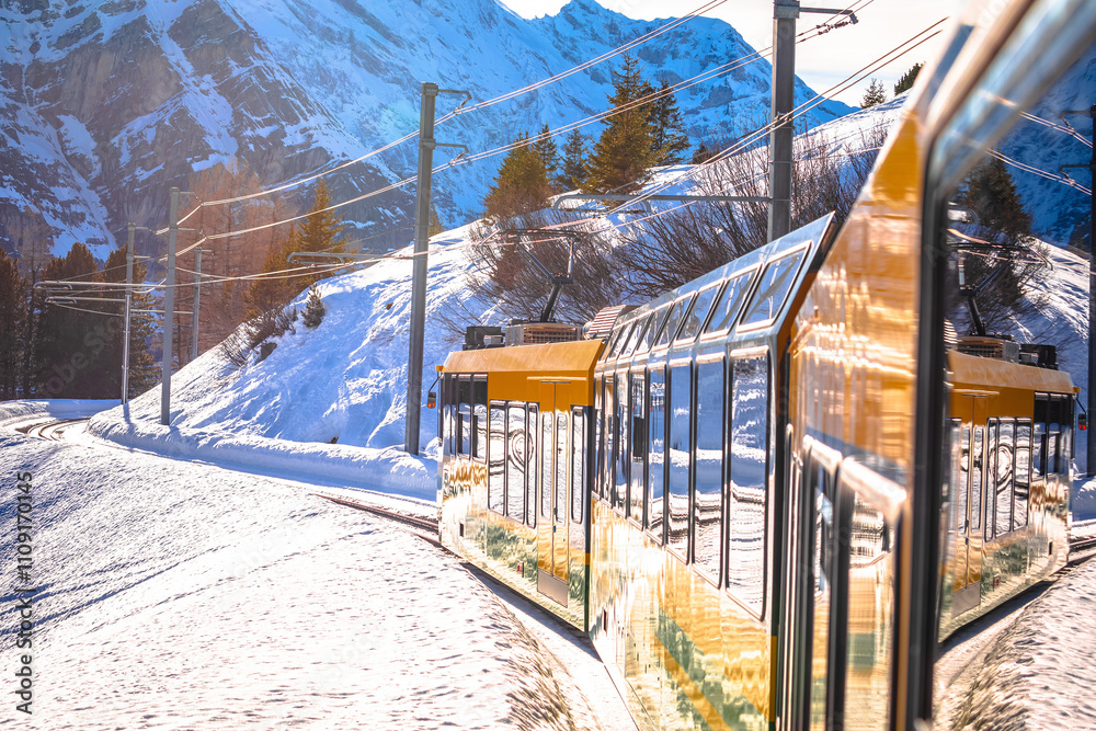Wengen railway to Jungfraujoch peak train in winter landscape view, Berner Oberland
