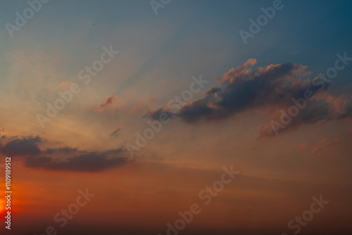 The sky is a beautiful shade of blue with a few clouds scattered throughout