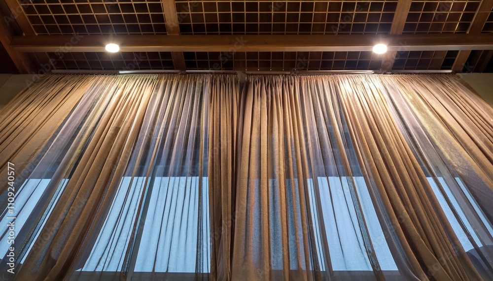 Obraz premium two layers curtain with rails installed on ceiling translucent and blocking lights curtain