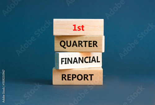 1st quarter financial report symbol. Concept words 1st quarter financial report on beautiful wooden blocks. Beautiful grey background. Business 1st quarter financial report concept. Copy space. photo