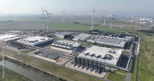 Aerial view of windmills and Large data center in the Eemshaven