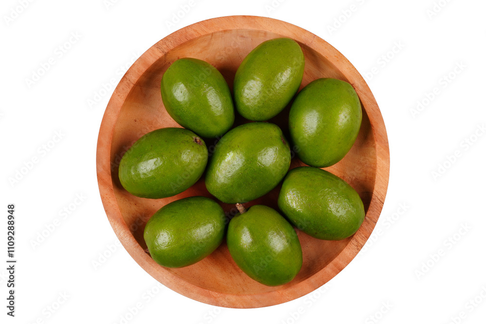 Fresh kedondong or ambarella fruit on a wooden plate isolated transparent Fresh kedondong or ambarella fruit on a wooden plate isolated transparent