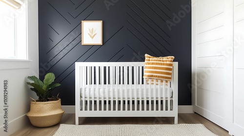 Christmas nursery decor ornament modern. A modern nursery with a white crib, decorative pillow, and a dark accent wall, featuring a plant and framed artwork. photo
