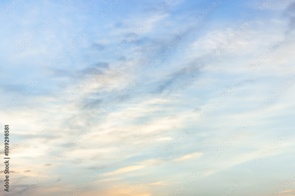 Obraz premium A beautiful sky tinted by the sun leaving vibrant shades of gold, pink, blue and multicolored. Clouds in the twilight evening and morning sky. Cloudy sky background in the evening, and during the day.