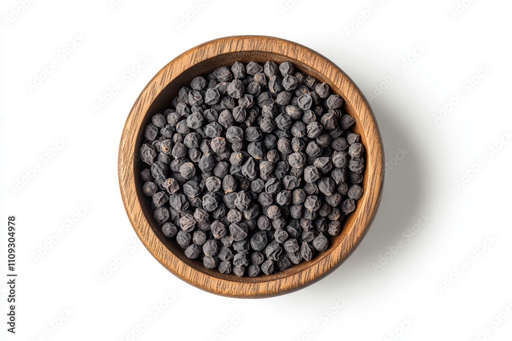 Dehydrated goji berries in a wooden bowl above on white background Dehydrated goji berries in a wooden bowl above on white background