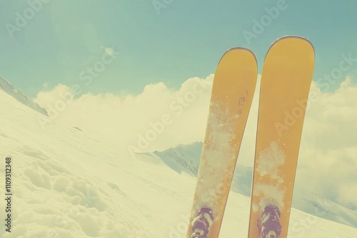 Yellow ski equipment on a snow-covered mountain with alpine views and a vintage filter. AI generated illustration