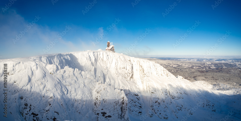 panoramic view on Sniezne Kotly - famous valley in Giant mountains during winter sunny day in Poland