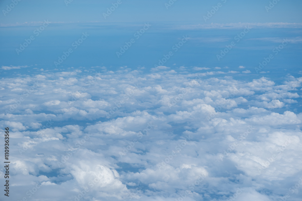 Naklejka premium Sky and cloud seen from window of airplane